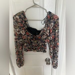 Patterned floral crop top with sort of corset style waist (not that tight). M.